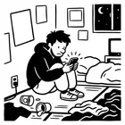 ワンルームの床に座り、スマホを見ている男性